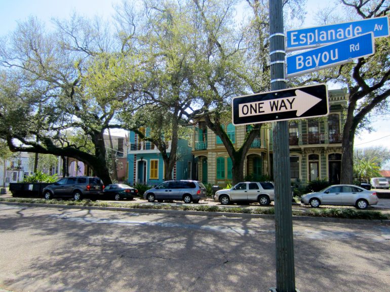 Road Trip USA: Street signs and cars on the Esplanade, New Orleans