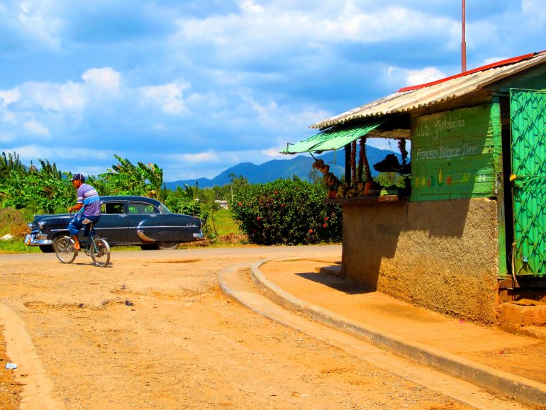 Cycling Cuba: Car, bike and shop along the road