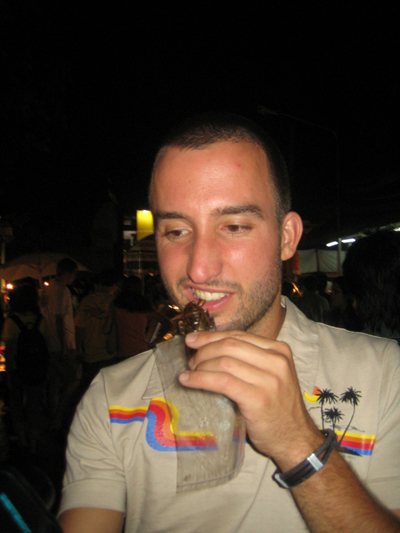 Strange foods: Marco Buch eating a fried waterbug