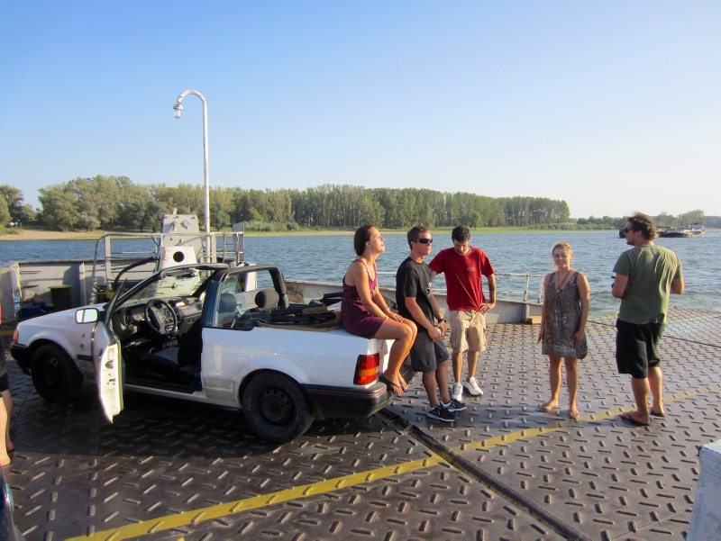 People on the car-ferry over the Danube