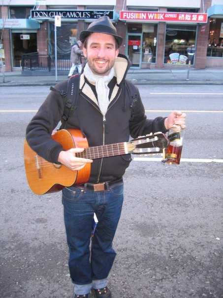 Marco Buch with guitar in Vancouver