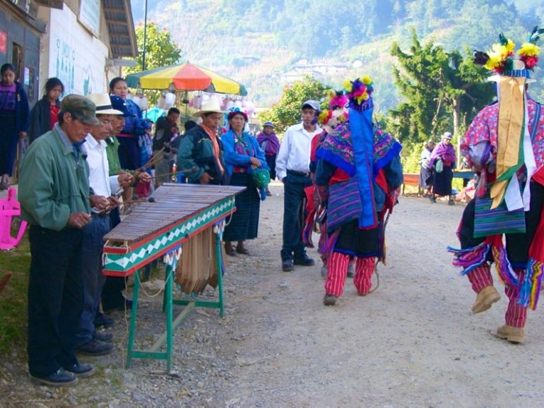 Most beautiful cemeteries: Marimba player and people in costumes