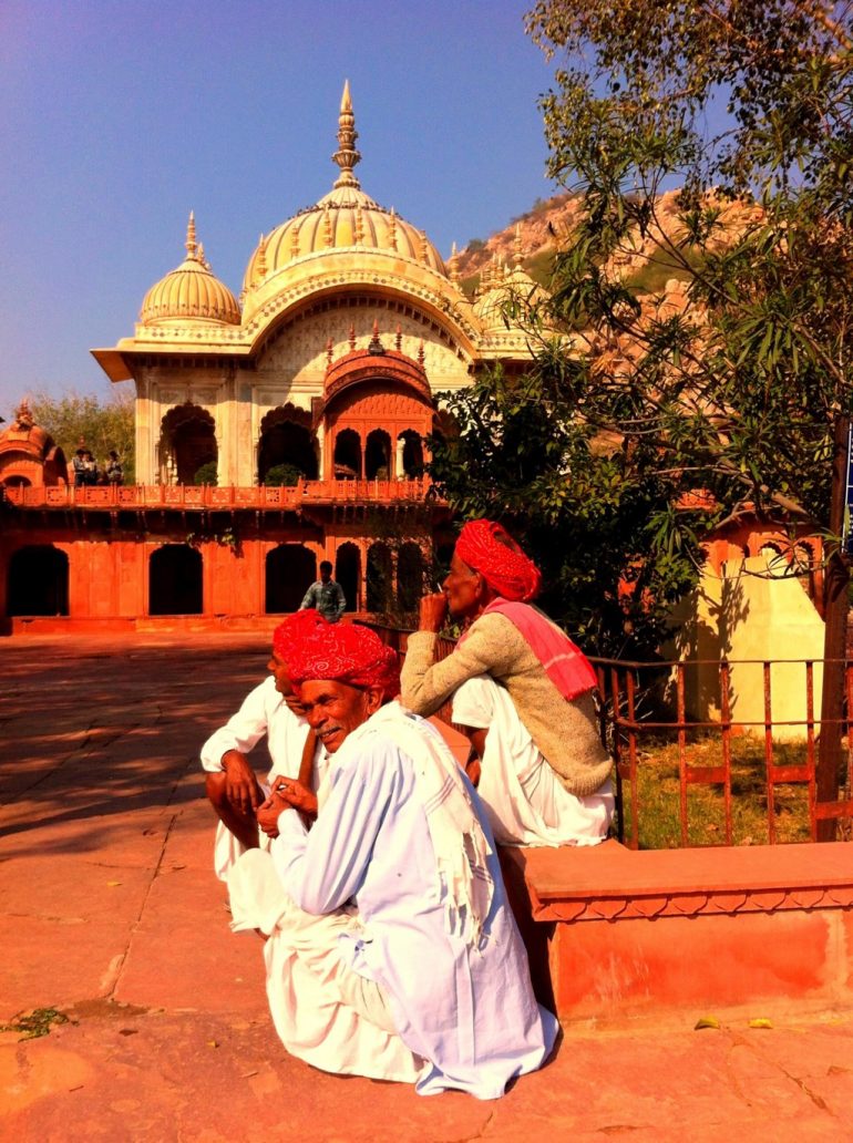 Renting an Enfield in India: Men in front of a temple in Alwar