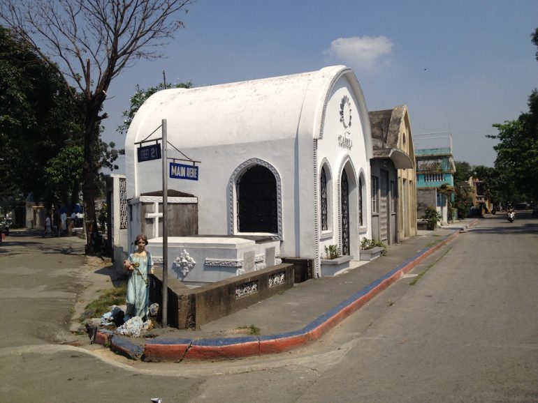 Most beautiful cemeteries: Street and graves in Manila 